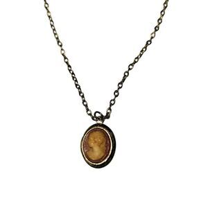 1928 Cameo Lockett Gold Tone necklace